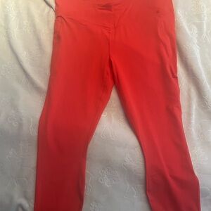 Fabletics Red capri Leggings with Smooth Stretchy Fabric. Side pockets. Worn 2x